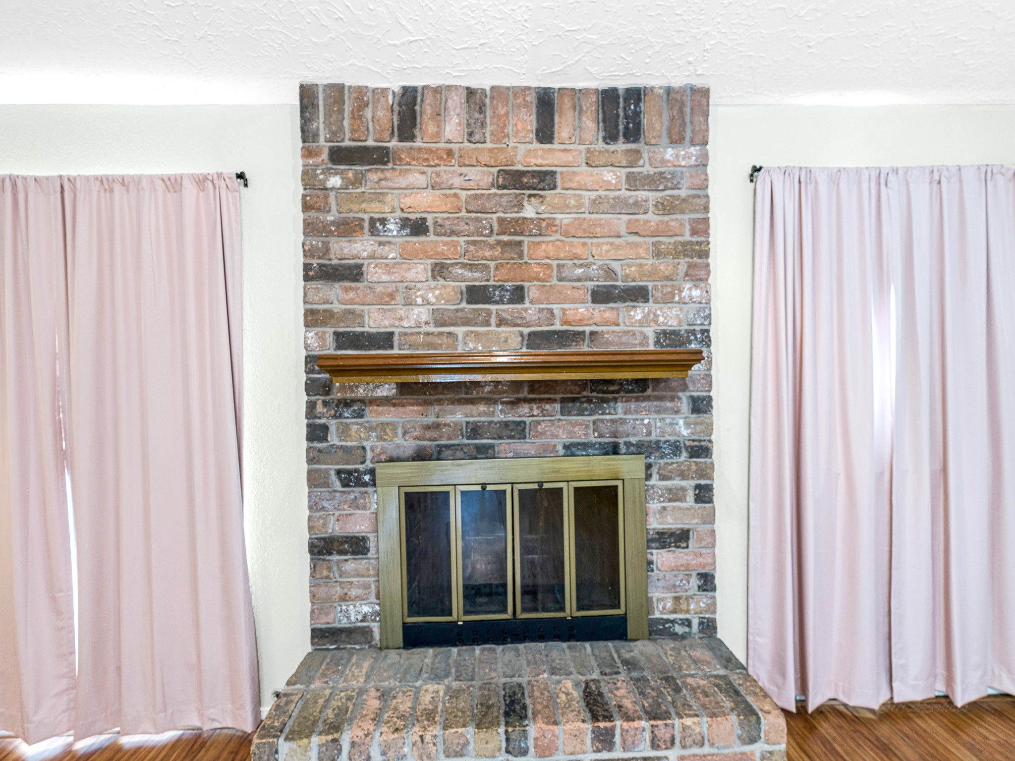 22906 Squirrel Tree Street Spring, TX 77389 - Photo 18 of 41 a closeup of a fireplace