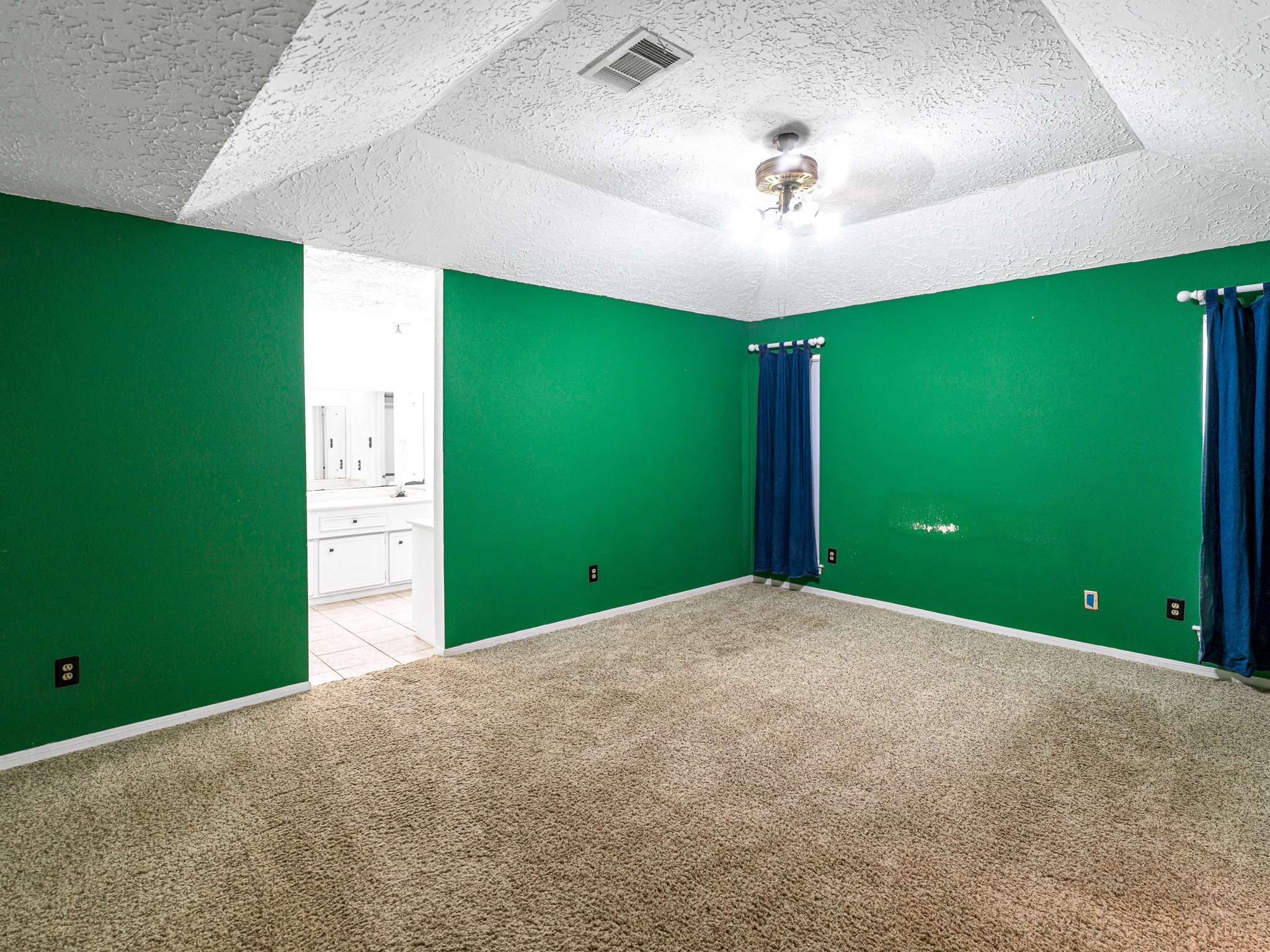 22906 Squirrel Tree Street Spring, TX 77389 - Photo 19 of 41 a view of a room with a flat screen tv