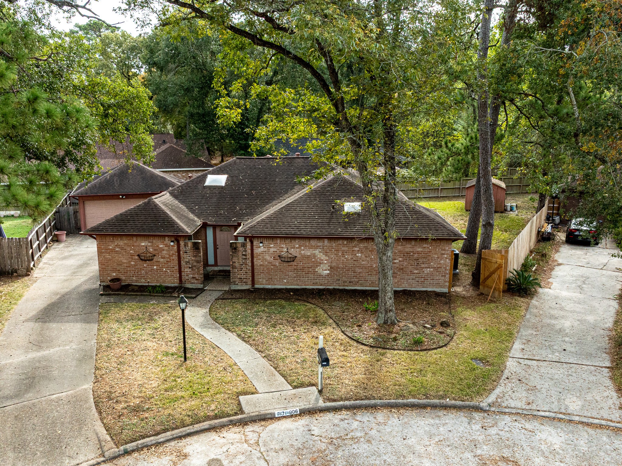 22906 Squirrel Tree Street Spring, TX 77389 - Photo 34 of 41 a view of a backyard with a small pool