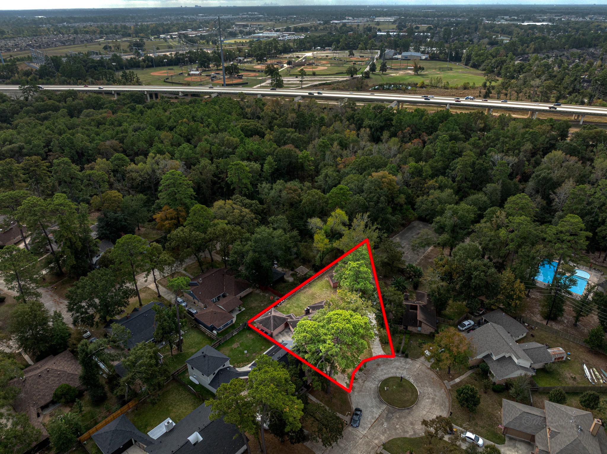 22906 Squirrel Tree Street Spring, TX 77389 - Photo 39 of 41 an aerial view of a city with lots of residential buildings
