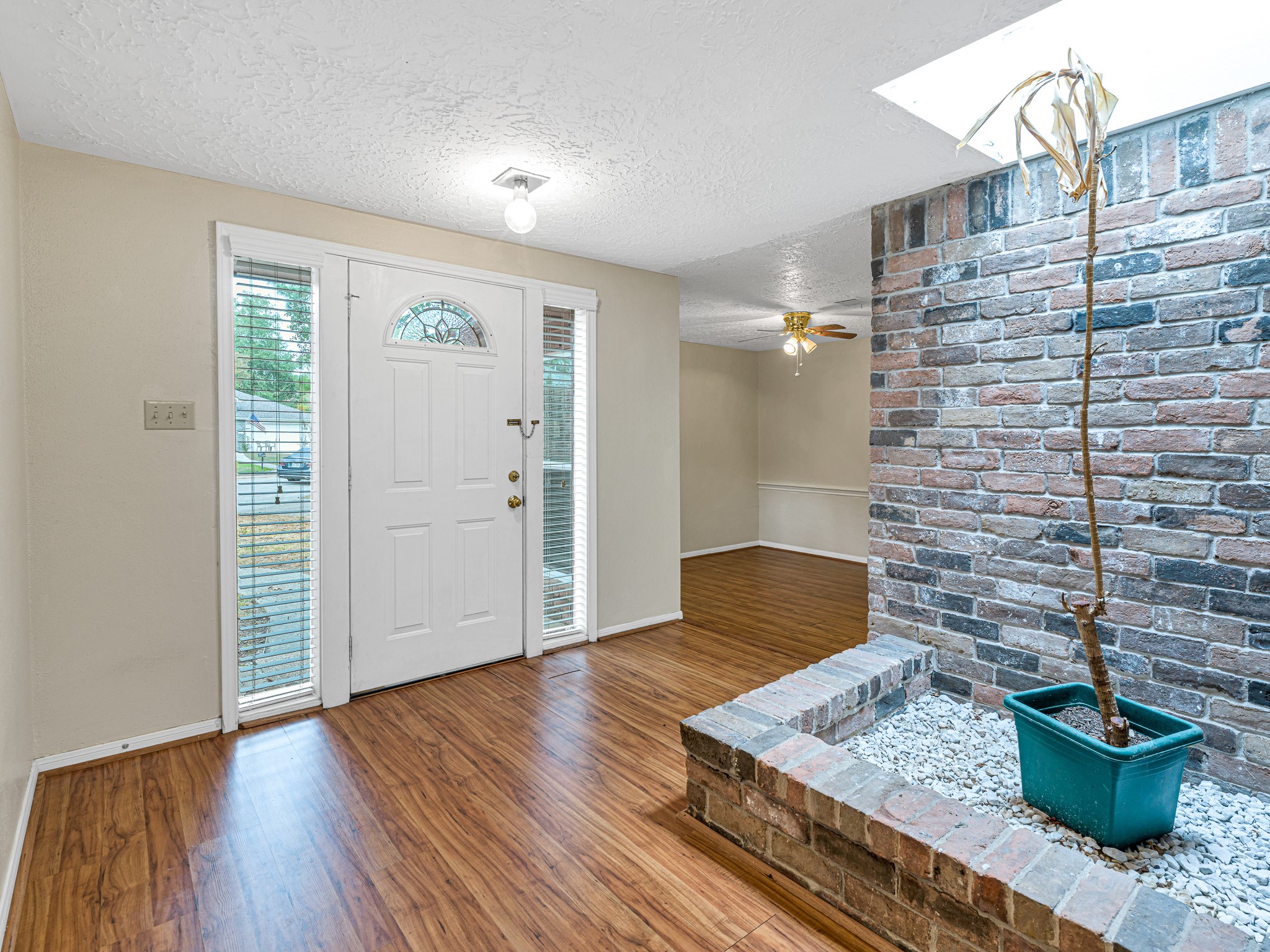 22906 Squirrel Tree Street Spring, TX 77389 - Photo 5 of 41 a view of an empty room and wooden floor