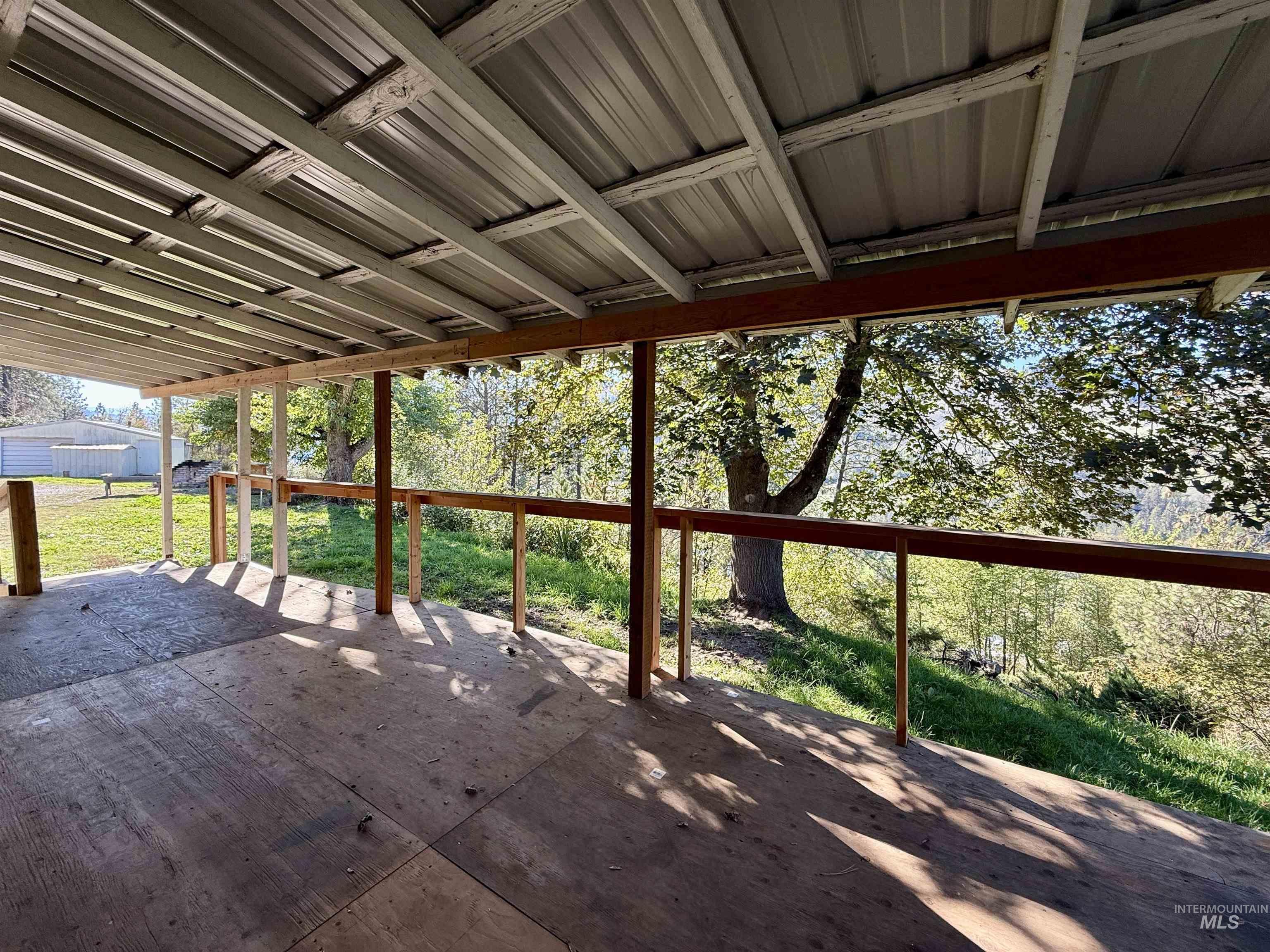 191 Battle Ridge Road Kooskia, ID 83539 - Photo 26 of 35 Deck with a patio and a yard