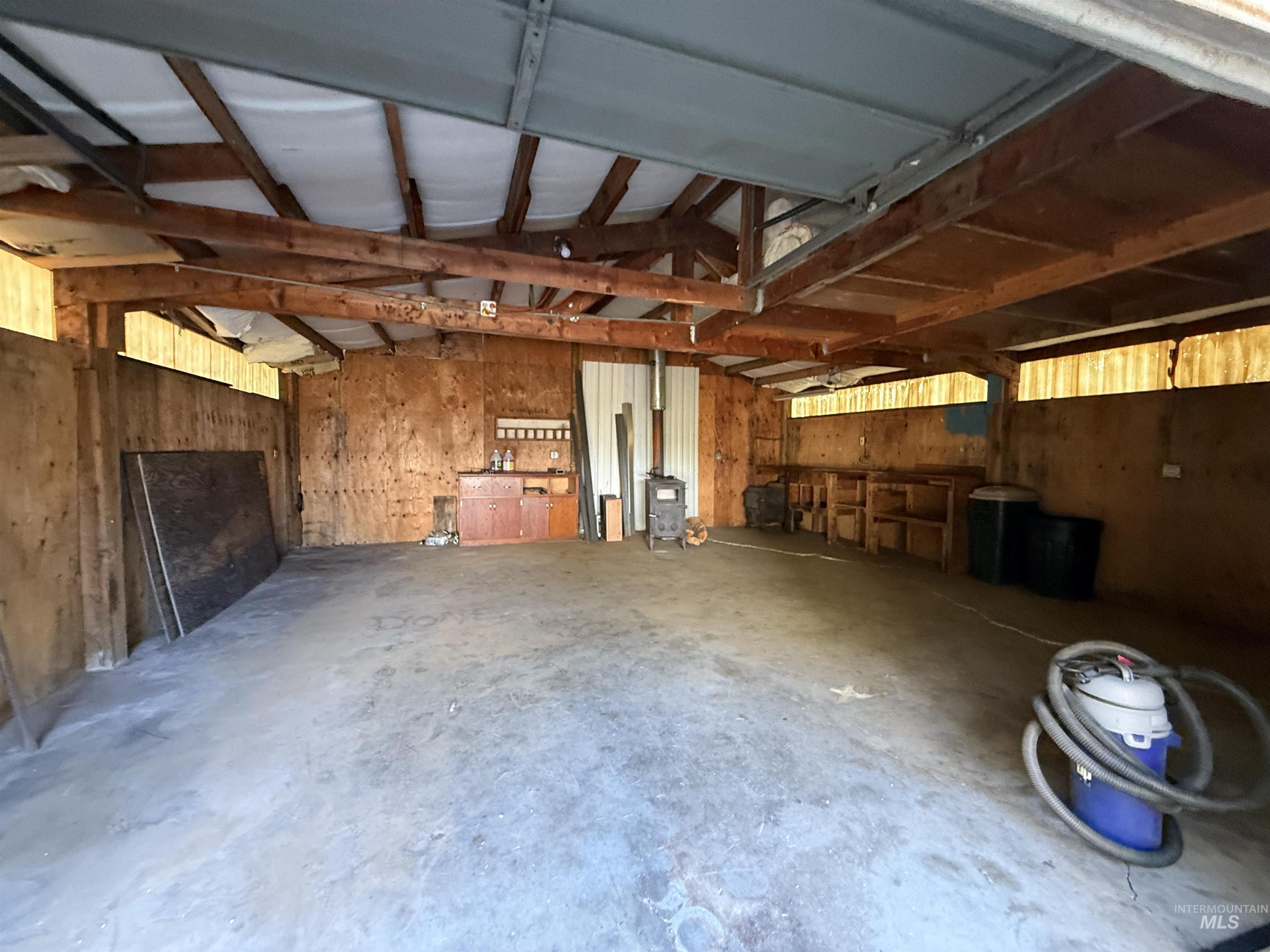 191 Battle Ridge Road Kooskia, ID 83539 - Photo 30 of 35 Garage featuring wood walls