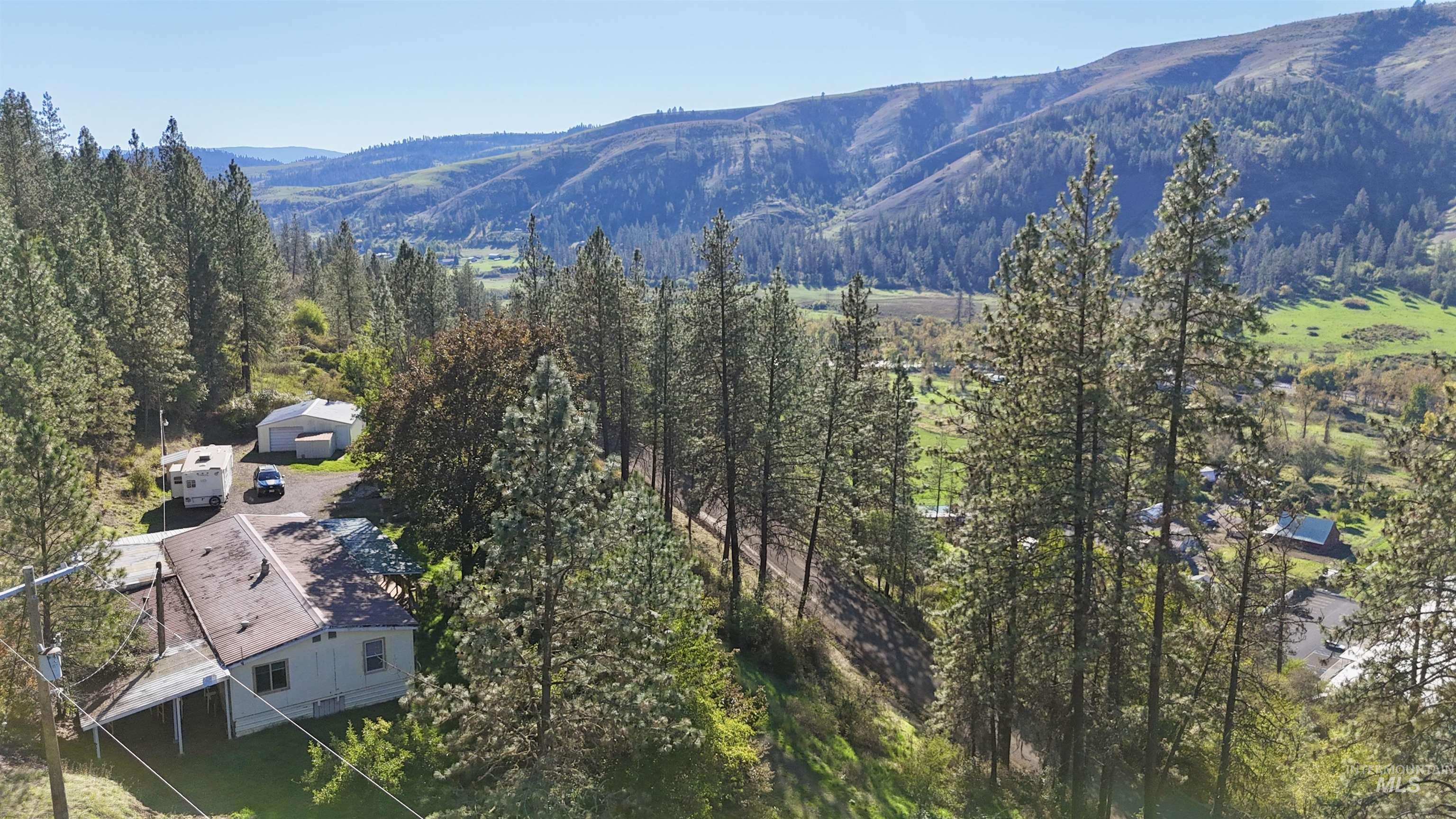 191 Battle Ridge Road Kooskia, ID 83539 - Photo 3 of 35 Bird's eye view of a mountainous background and a forest