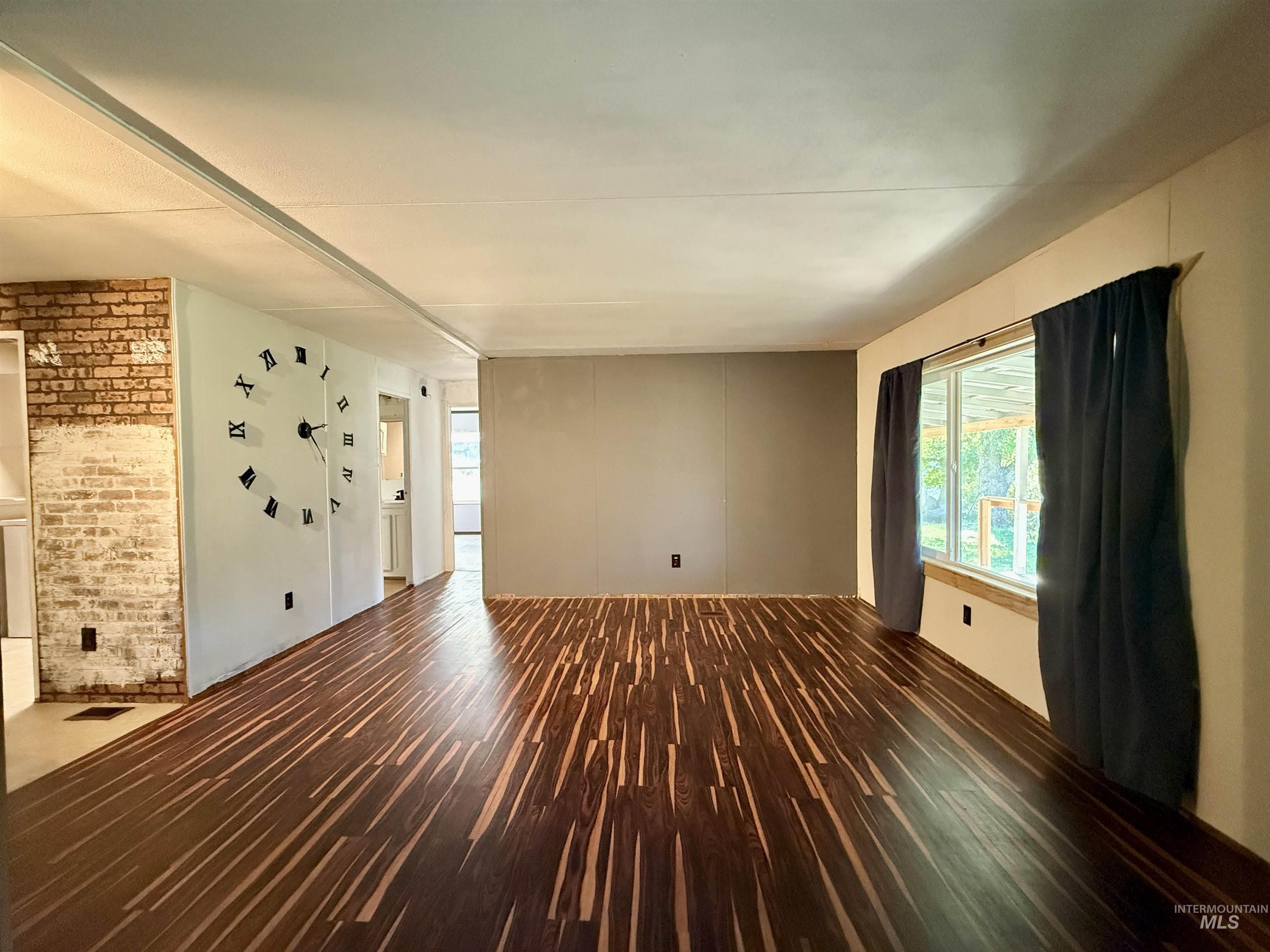 191 Battle Ridge Road Kooskia, ID 83539 - Photo 10 of 35 Spare room featuring wood finished floors