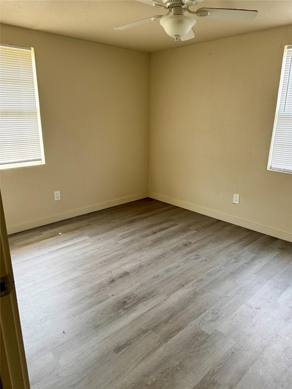 211 Sperry Lane Red Oak, TX 75154 - Photo 12 of 16 an empty room with a window