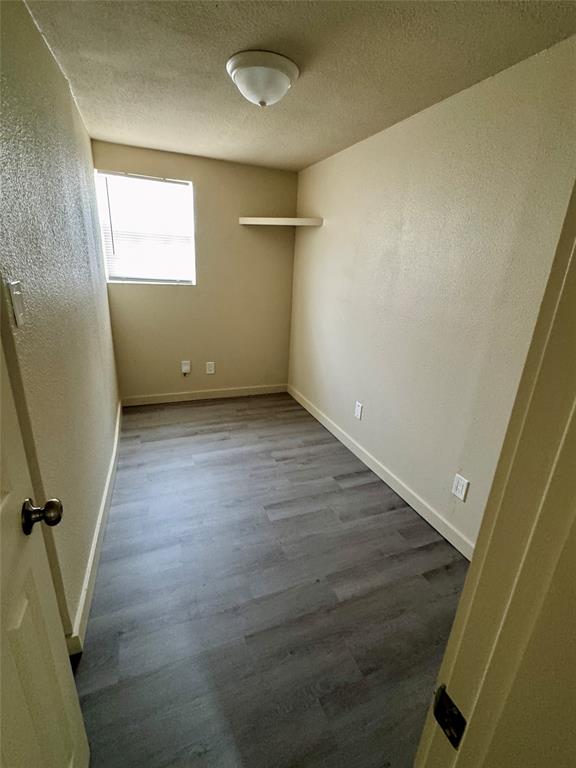 211 Sperry Lane Red Oak, TX 75154 - Photo 13 of 16 an empty room with windows