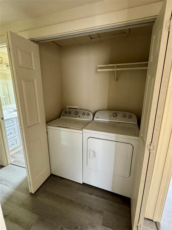 211 Sperry Lane Red Oak, TX 75154 - Photo 14 of 16 a utility room with dryer and washer