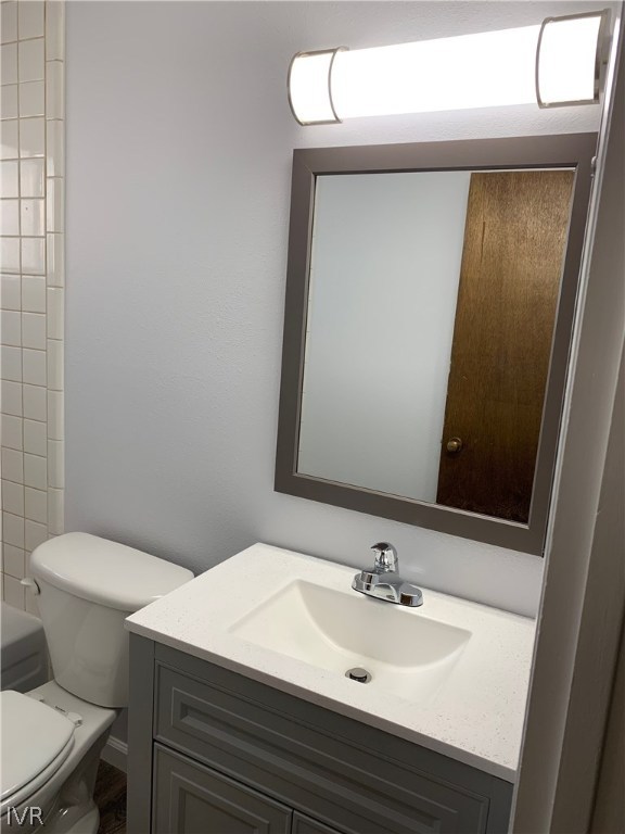 609 Village Boulevard Incline Village, NV 89451 - Photo 14 of 21 a bathroom with a sink a toilet and mirror