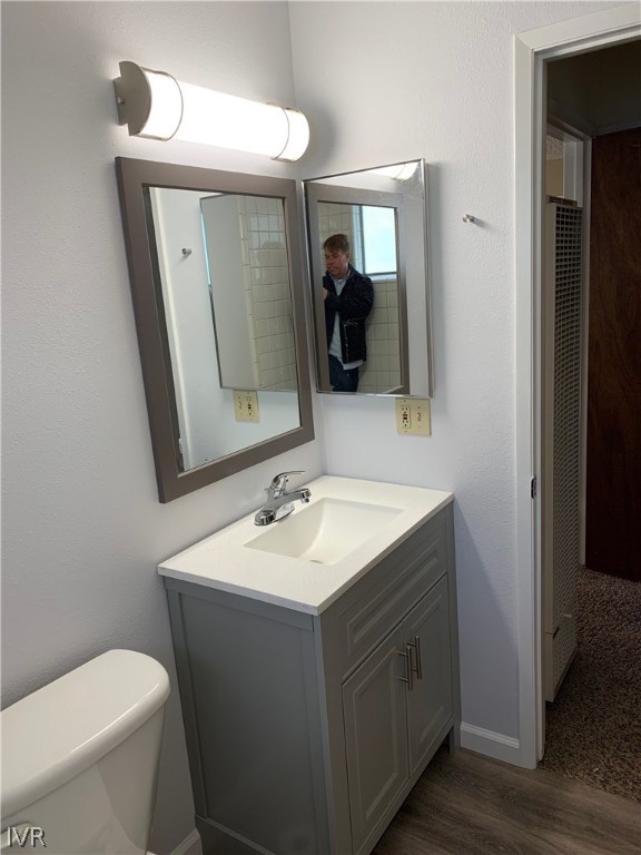 609 Village Boulevard Incline Village, NV 89451 - Photo 18 of 21 a bathroom with a toilet sink and mirror