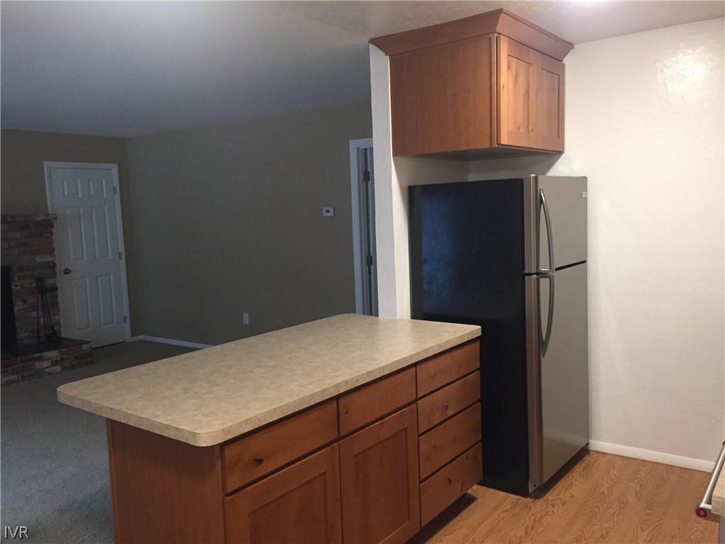 609 Village Boulevard Incline Village, NV 89451 - Photo 9 of 21 a kitchen that has a cabinets and a refrigerator