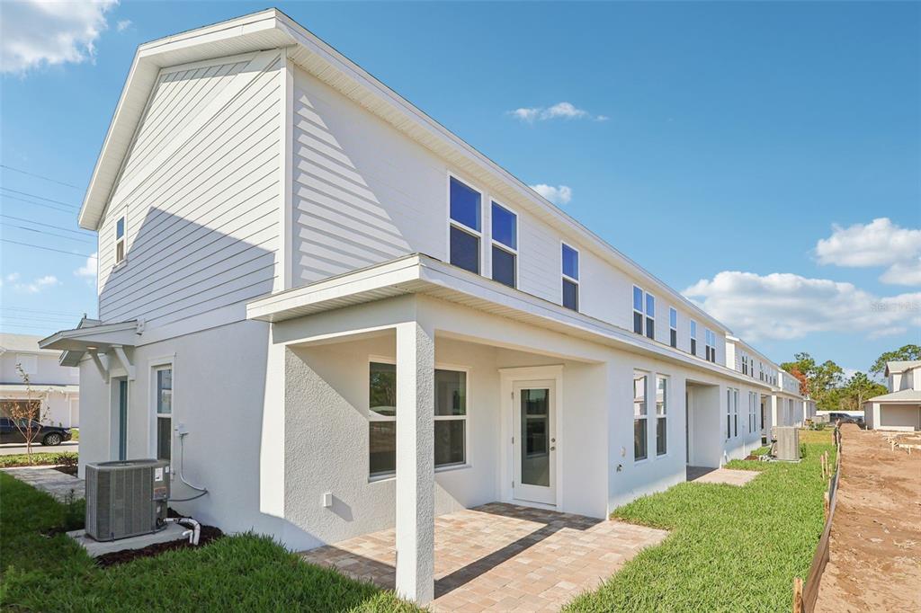 6493 Horseshoe Ln Way St. Cloud, FL 34773 - Photo 27 of 29 a view of a house with a yard