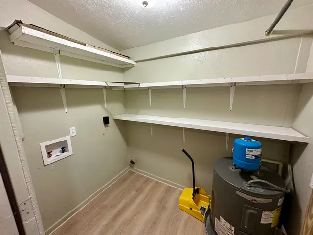 a room with storage and utility