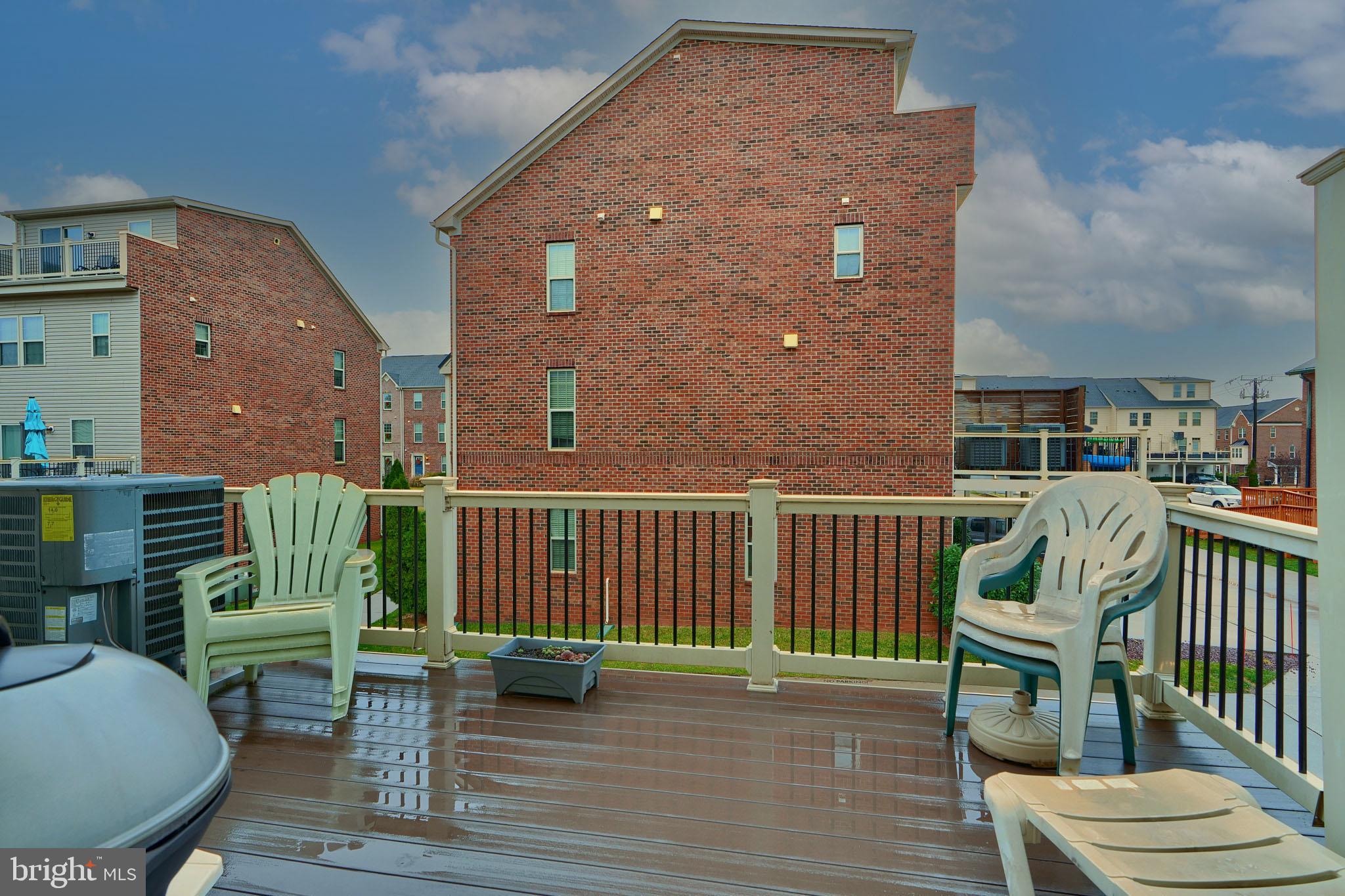 814 Oldham Street Baltimore, MD 21224 - Photo 20 of 45 a view of a chair and table in the balcony