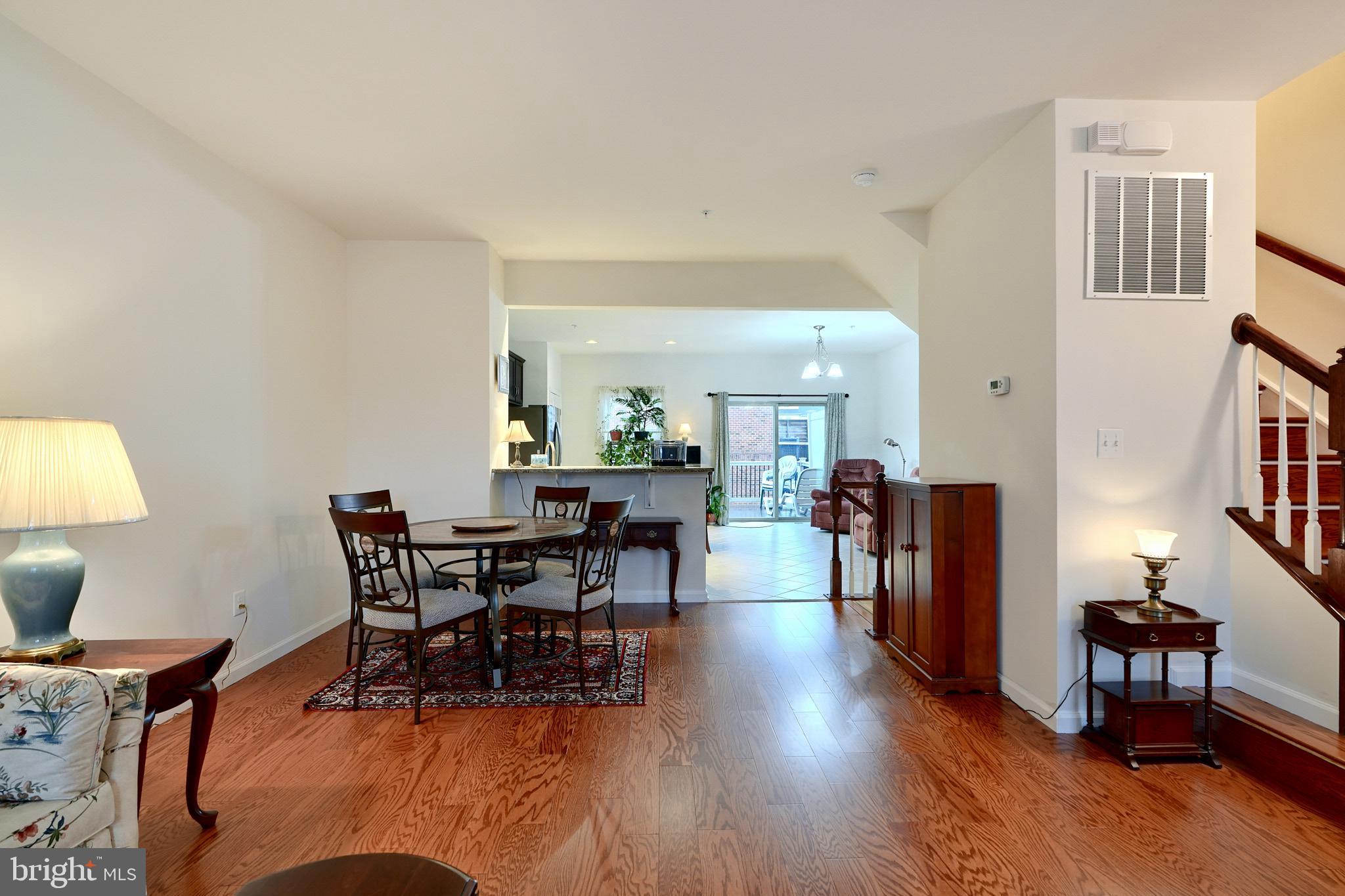 814 Oldham Street Baltimore, MD 21224 - Photo 9 of 45 a view of a dining room with furniture and wooden floor