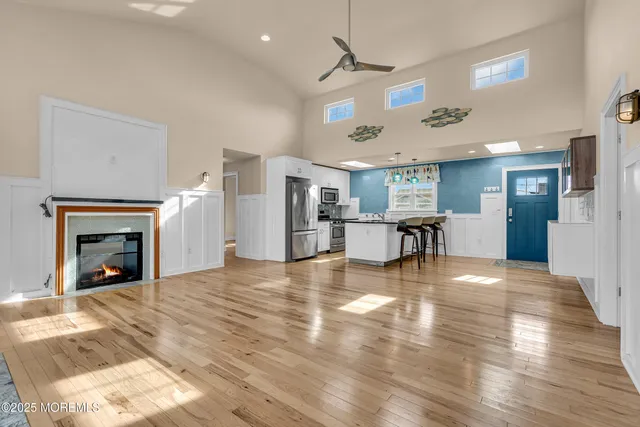 a view of a big room with air conditioner duct and materials on floor