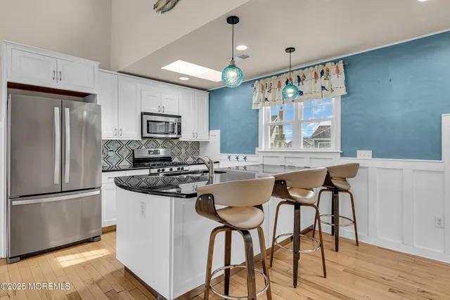a view of swimming pool with a lounge chair