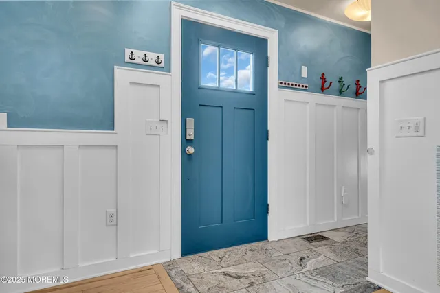 a kitchen with stainless steel appliances granite countertop a refrigerator microwave and stove top oven