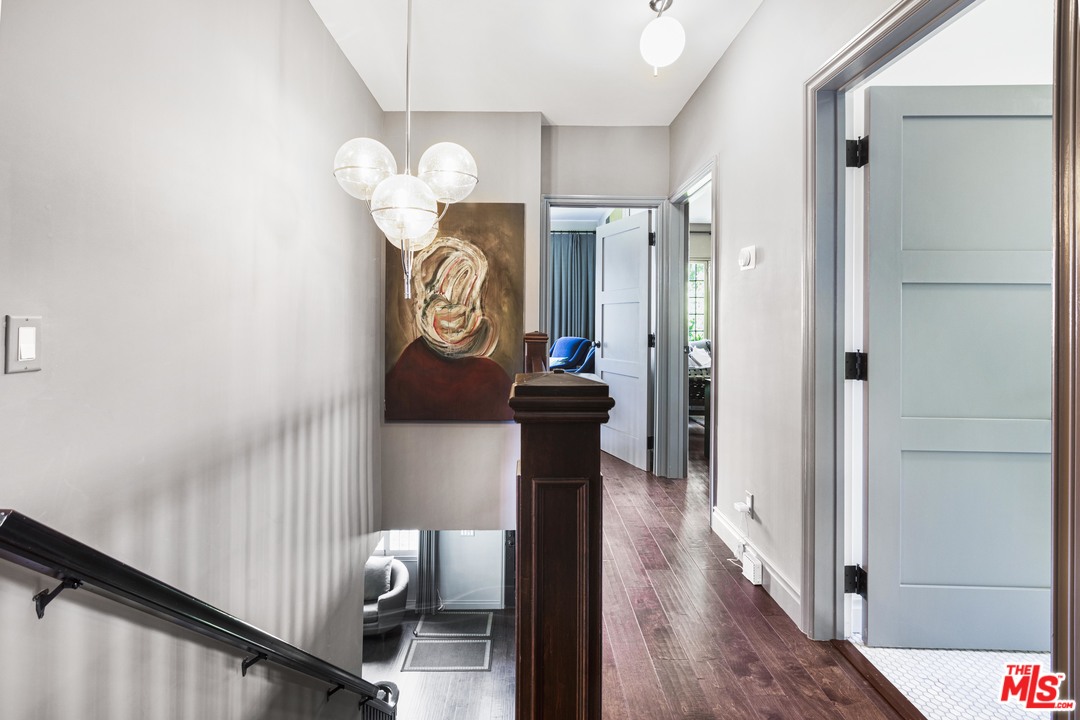 1908 Buckingham Road Los Angeles, CA 90016 - Photo 19 of 39 a view of entryway with wooden floor