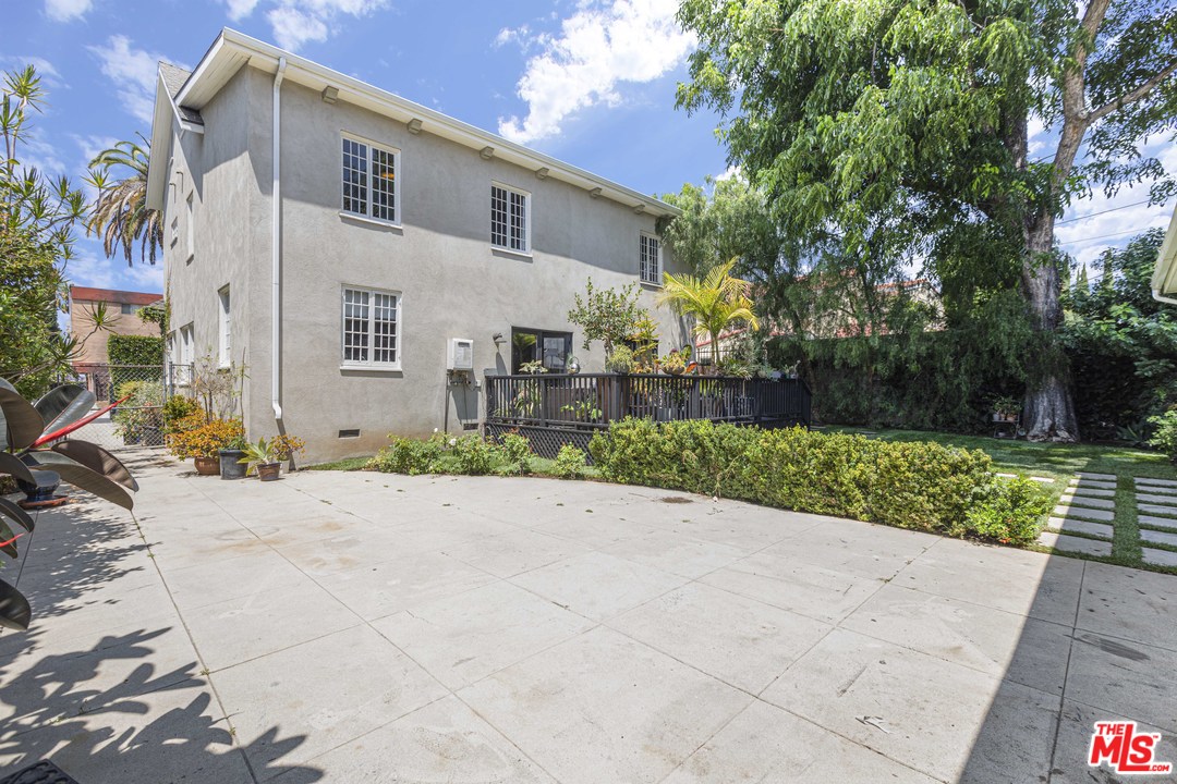 1908 Buckingham Road Los Angeles, CA 90016 - Photo 39 of 39 a view of a house with a yard