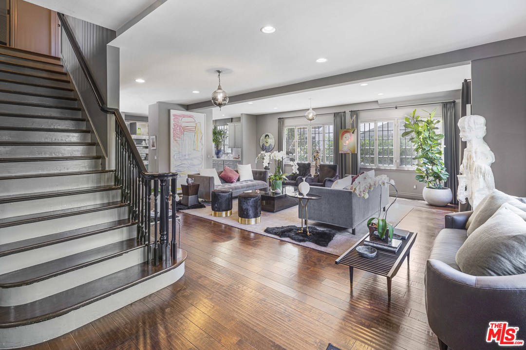 1908 Buckingham Road Los Angeles, CA 90016 - Photo 8 of 39 a living room with furniture and wooden floor