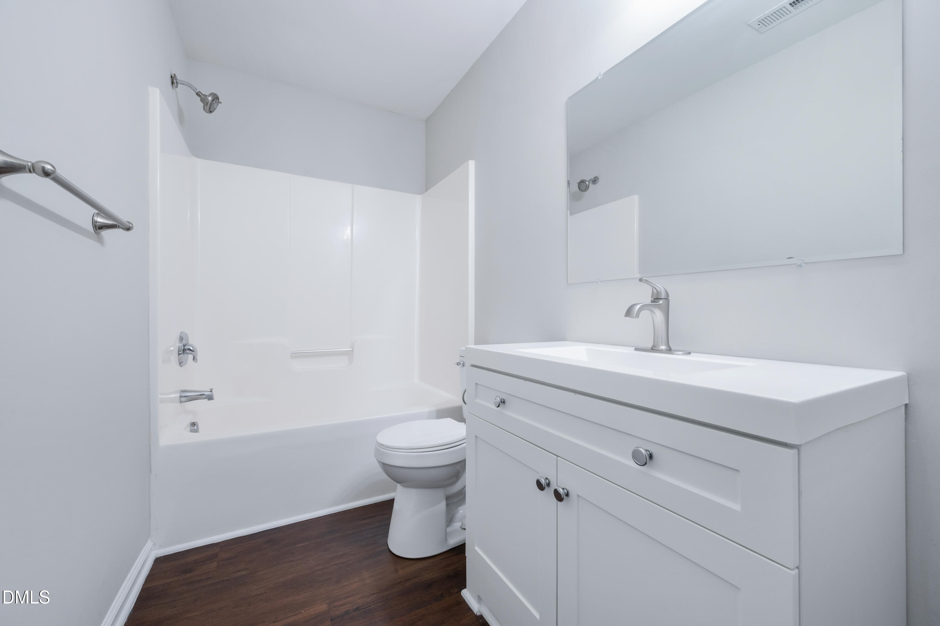 1532 Pebble Ridge Drive Raleigh, NC 27610 - Photo 33 of 40 a bathroom with a sink a toilet and shower
