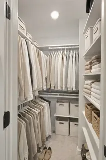 a bathroom with a sink vanity and a mirror