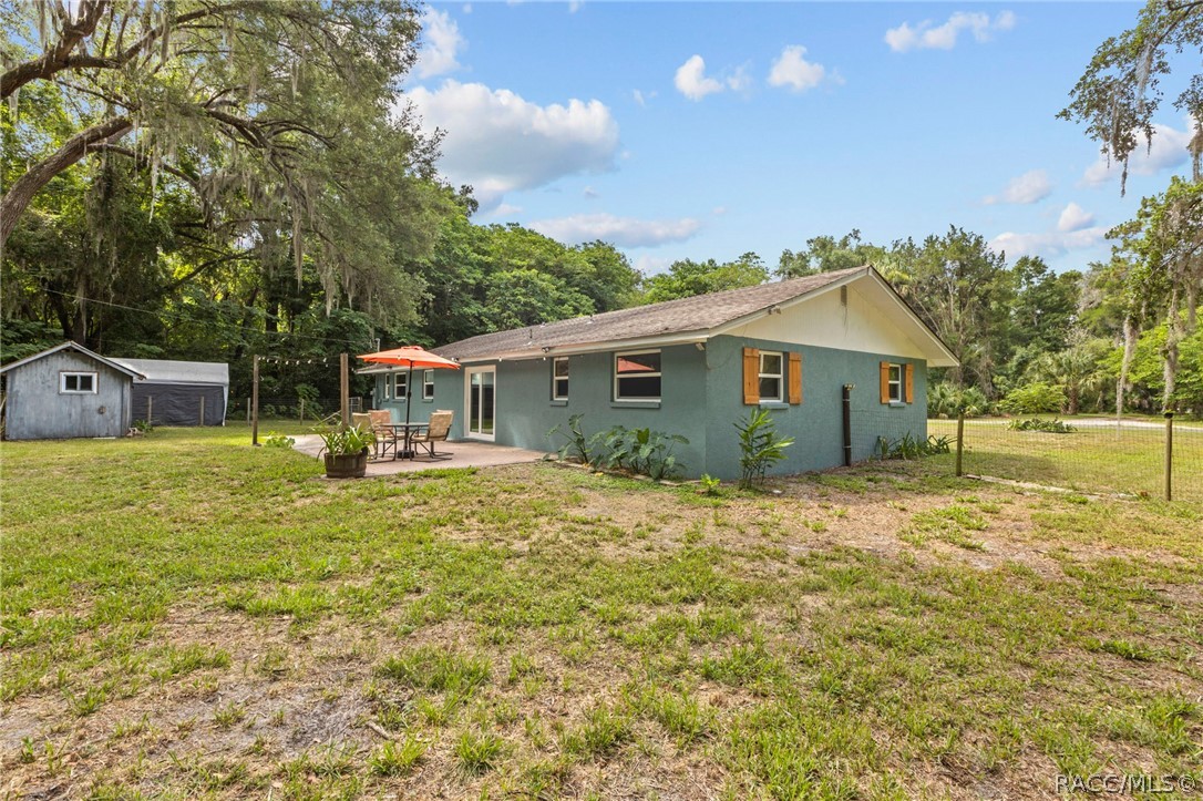 107 Allen Avenue Inglis, FL 34449 - Photo 29 of 36 a view of house with backyard