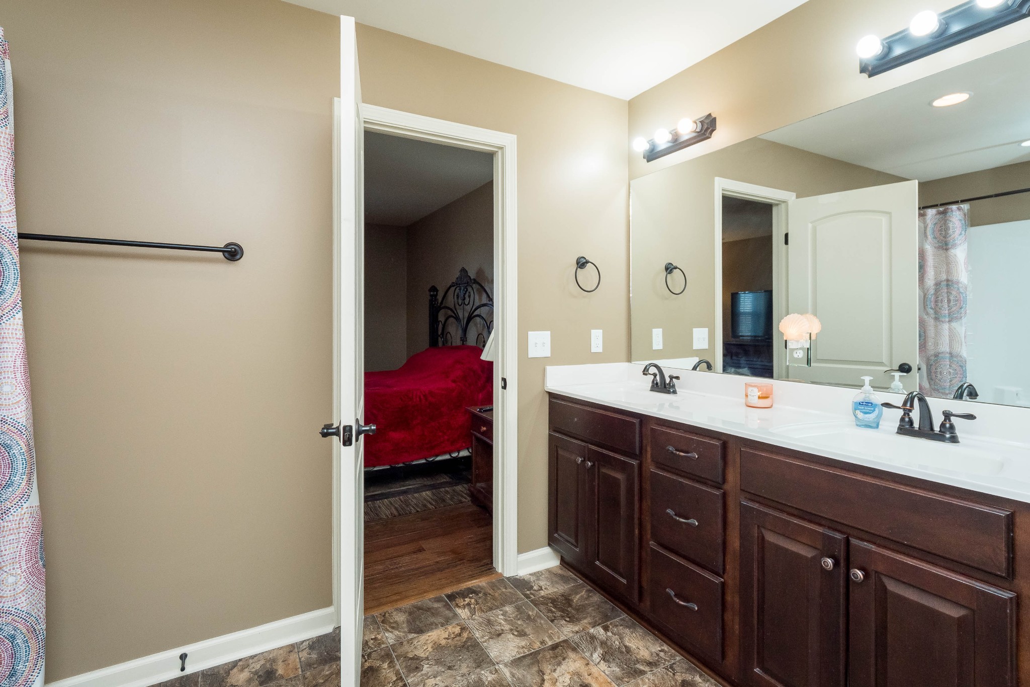 736 Lear Road Portland, TN 37148 - Photo 13 of 21 a spacious bathroom with a double vanity sink and a mirror