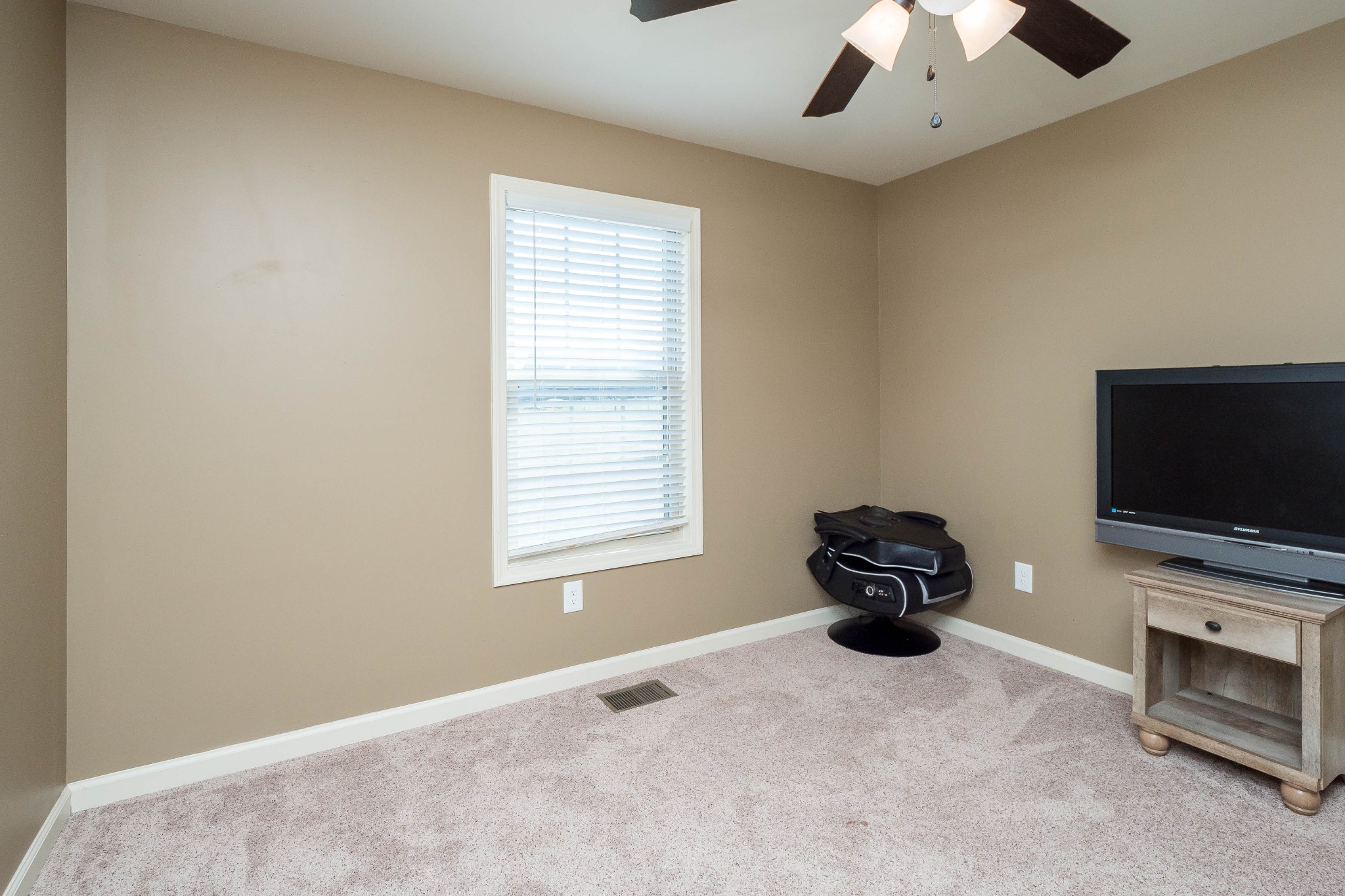 736 Lear Road Portland, TN 37148 - Photo 16 of 21 a living room with furniture and a flat screen tv