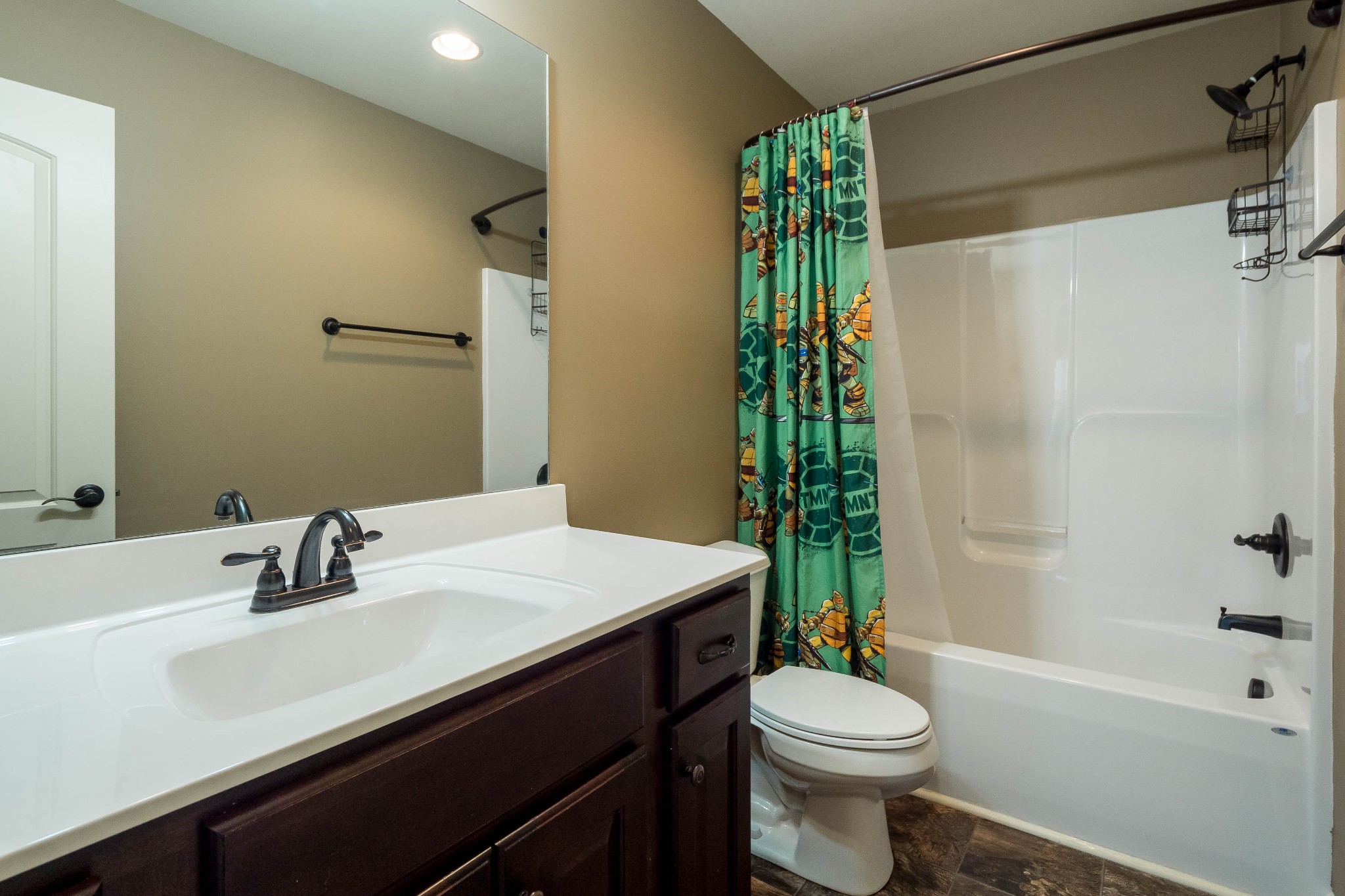 736 Lear Road Portland, TN 37148 - Photo 18 of 21 a bathroom with a sink a toilet and shower