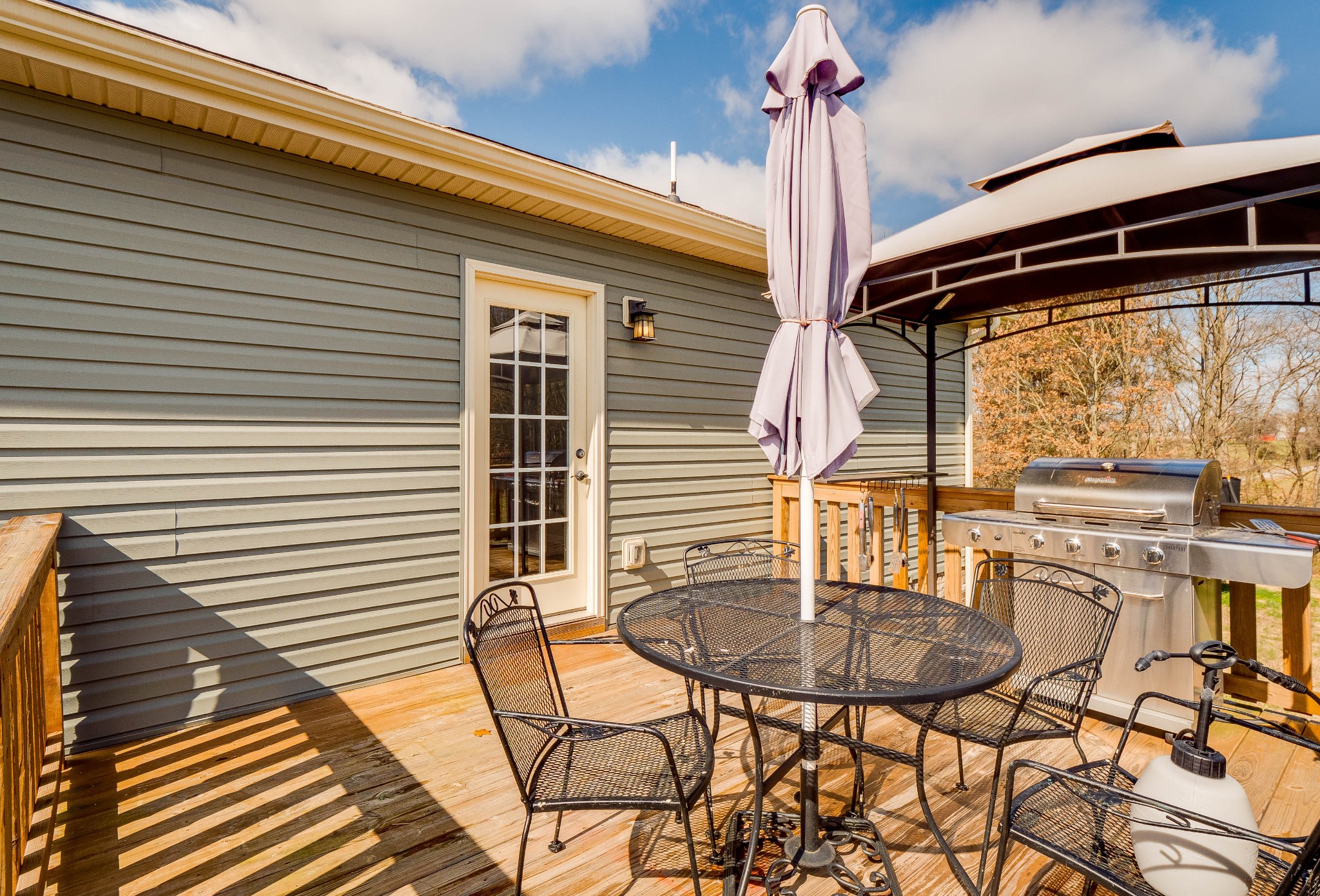 736 Lear Road Portland, TN 37148 - Photo 19 of 21 a view of a patio with a table and chairs