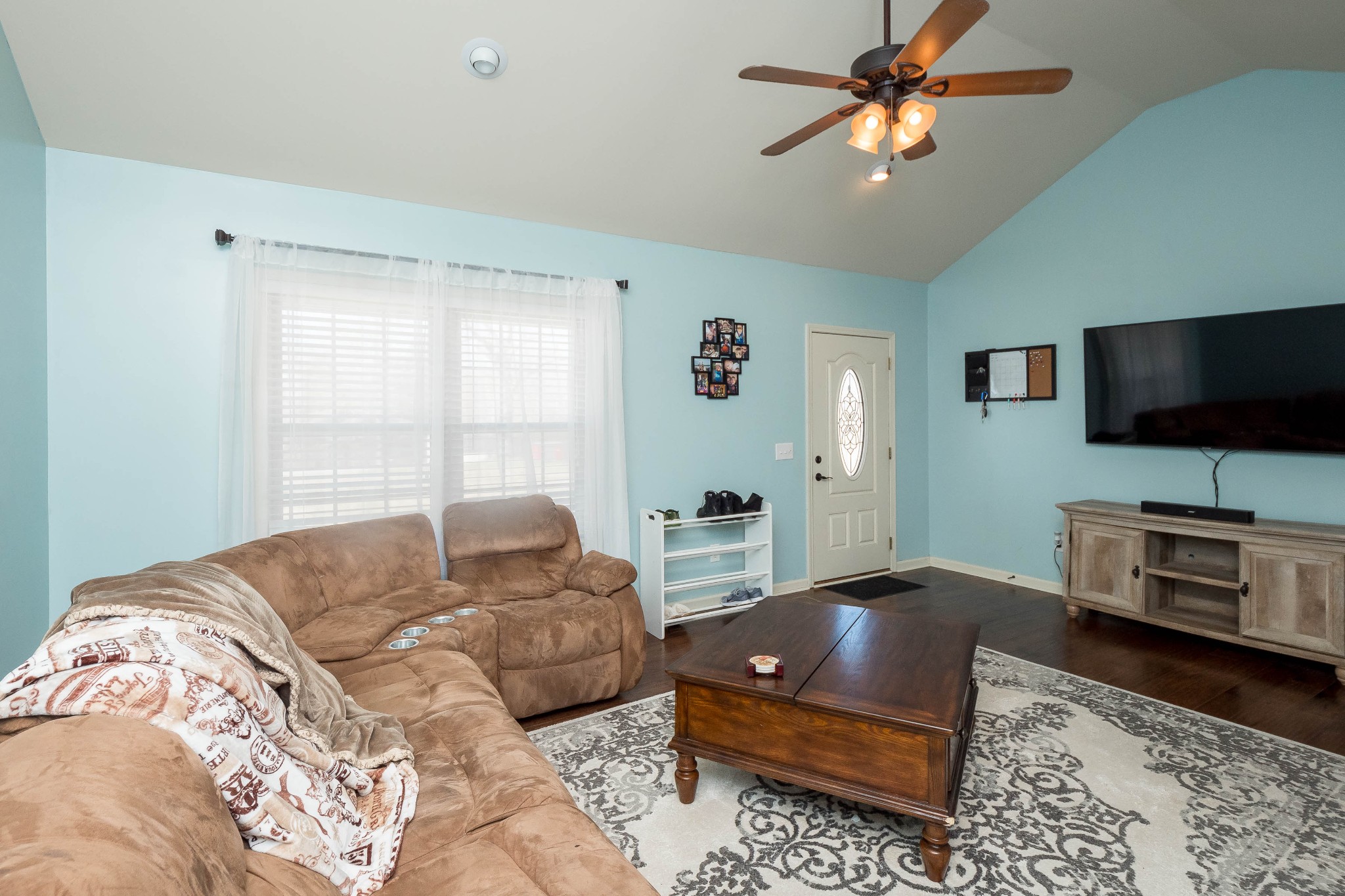 736 Lear Road Portland, TN 37148 - Photo 4 of 21 a living room with furniture and a flat screen tv