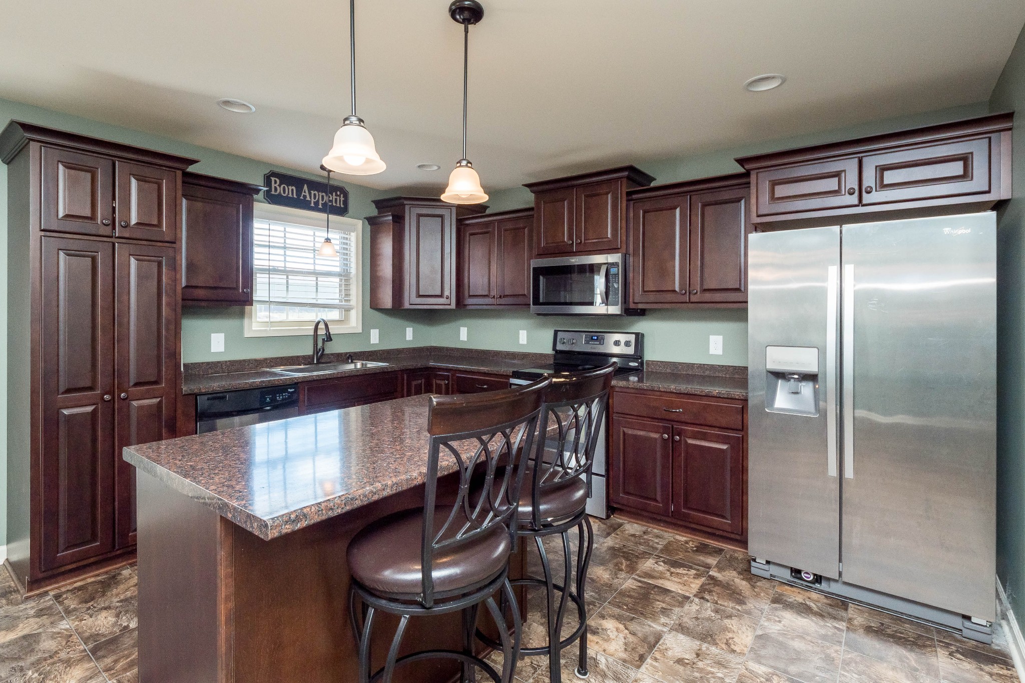 736 Lear Road Portland, TN 37148 - Photo 9 of 21 a kitchen with stainless steel appliances granite countertop a refrigerator a sink dishwasher a stove and a refrigerator