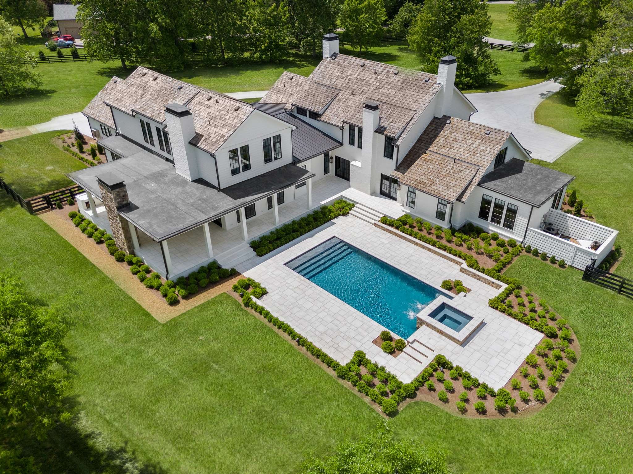 an aerial view of a house with a garden