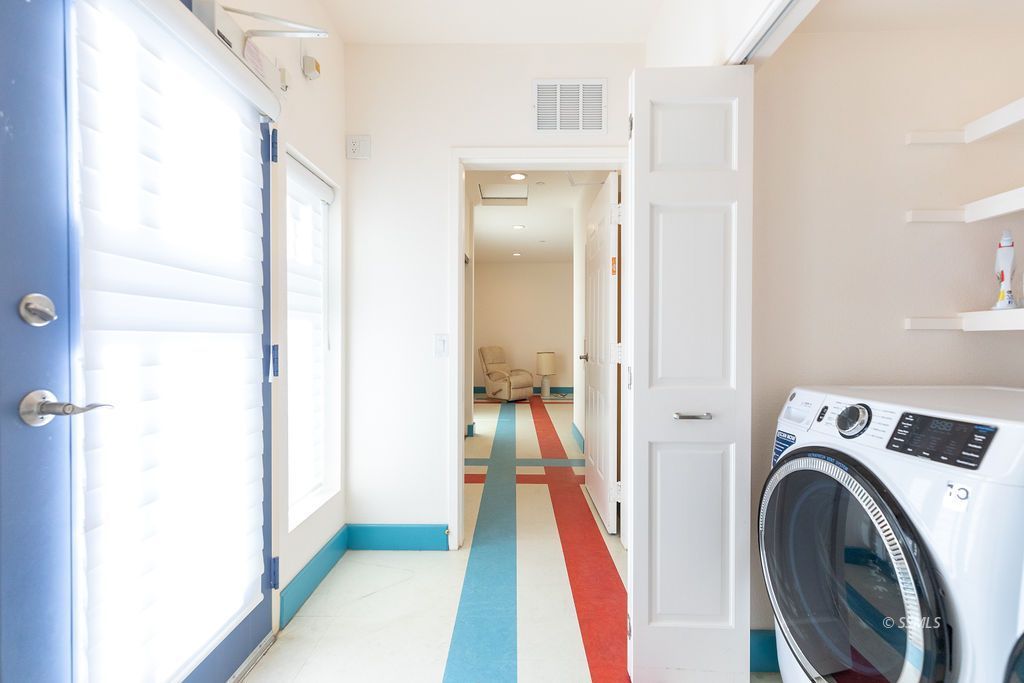 1325 Dunes Street Ridgecrest, CA 93555 - Photo 33 of 50 a view of hallway with washer and dryer