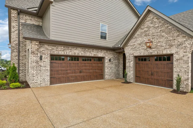 a view of a livingroom with a fireplace and window