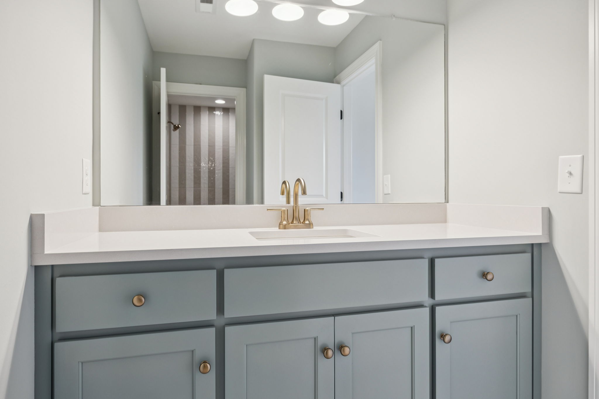 217 Bellsford Road Gallatin, TN 37066 - Photo 45 of 73 a bathroom with a sink and a mirror