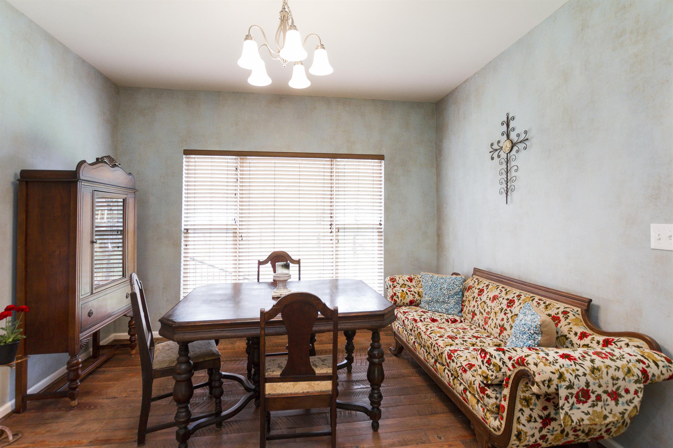 4194 Skelley Road Santa Fe, TN 38482 - Photo 3 of 30 a view of a dining room with furniture window and wooden floor