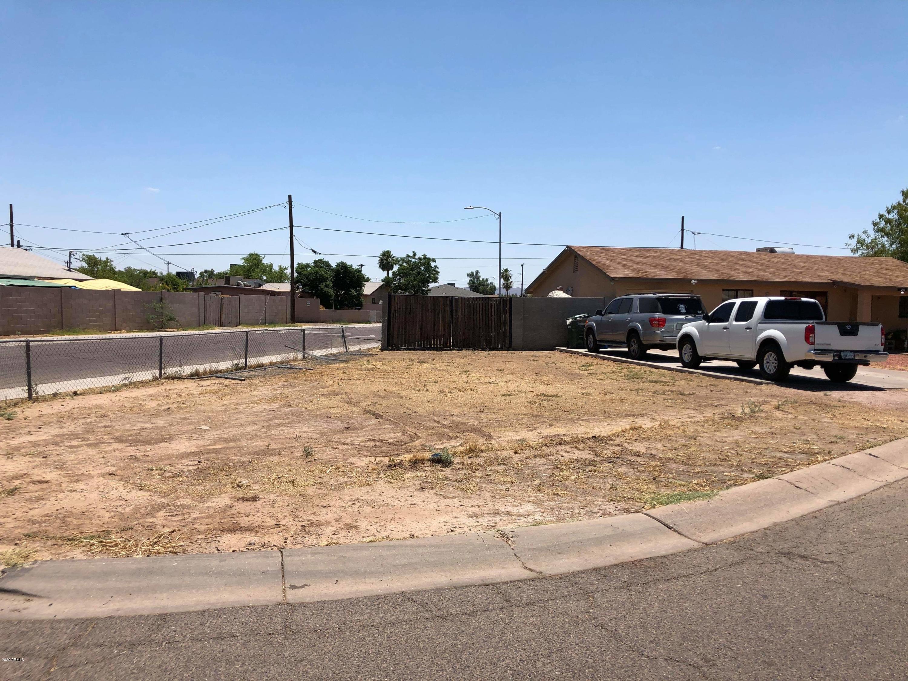 3601 West Coronado Road Phoenix, AZ 85009 - Photo 2 of 8 a view of street with cars