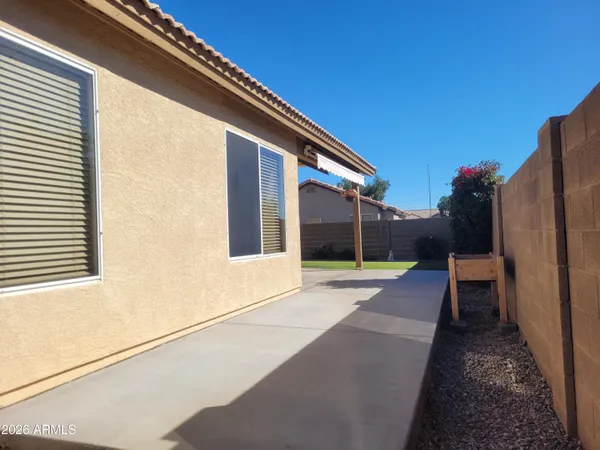 a backyard of a house with seating space
