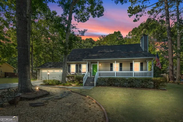 front view of a house with a yard