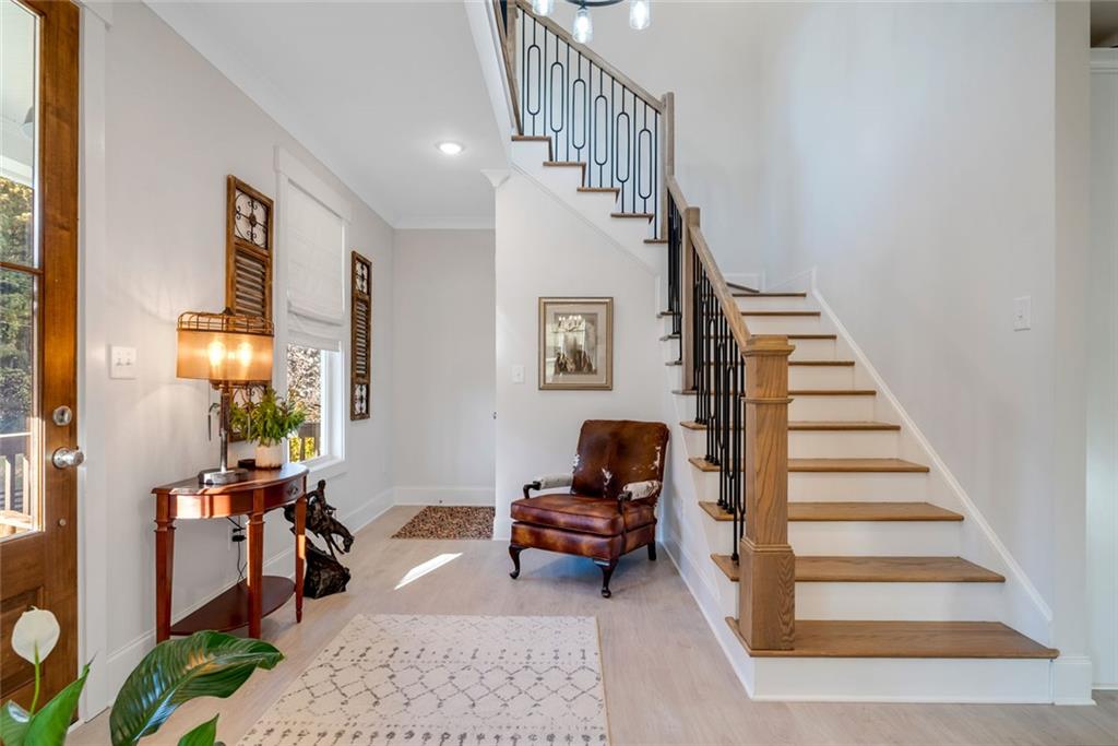 564 Old Airport Road Commerce, GA 30530 - Photo 4 of 39 a living room with furniture and stairs