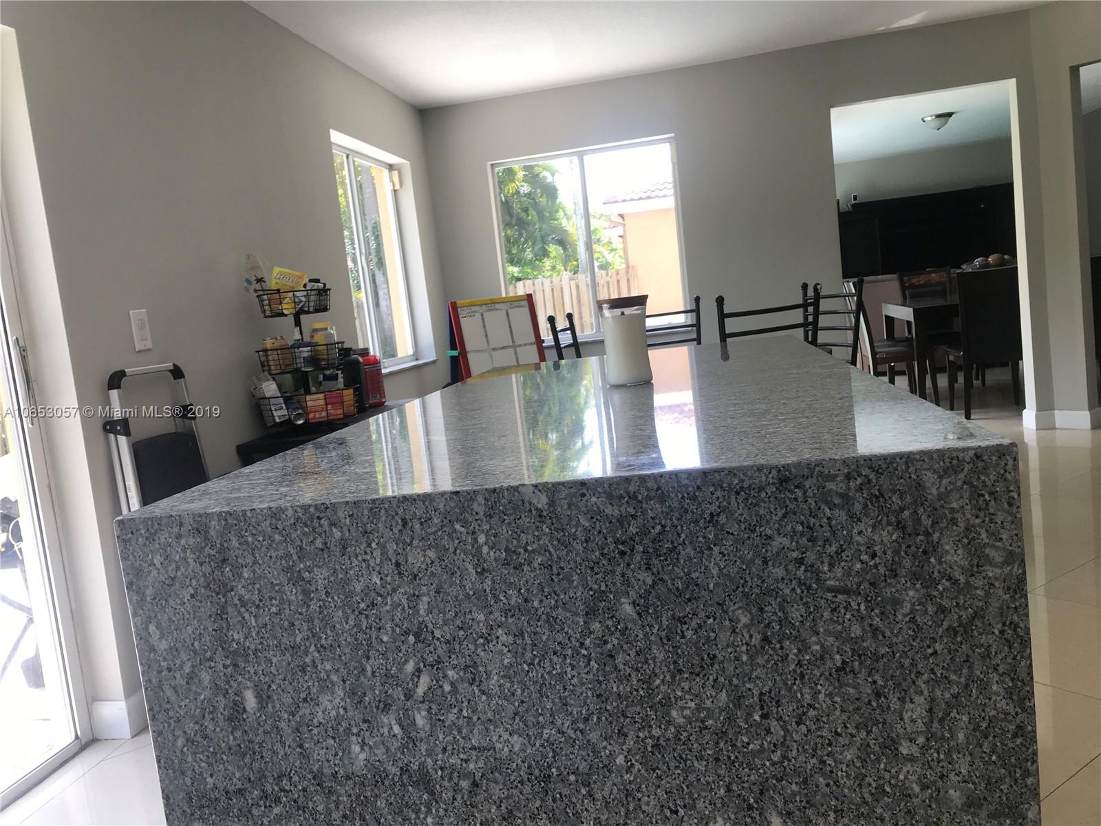 11212 Roundelay Road Cooper City, FL 33026 - Photo 3 of 30 a view of a living room and dining room