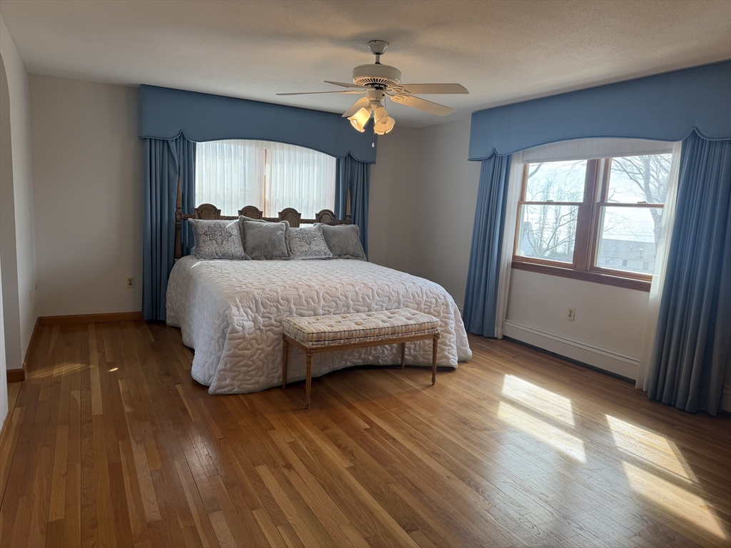 24 Flume Road Gloucester, MA 01930 - Photo 20 of 40 a bedroom with a bed and a window