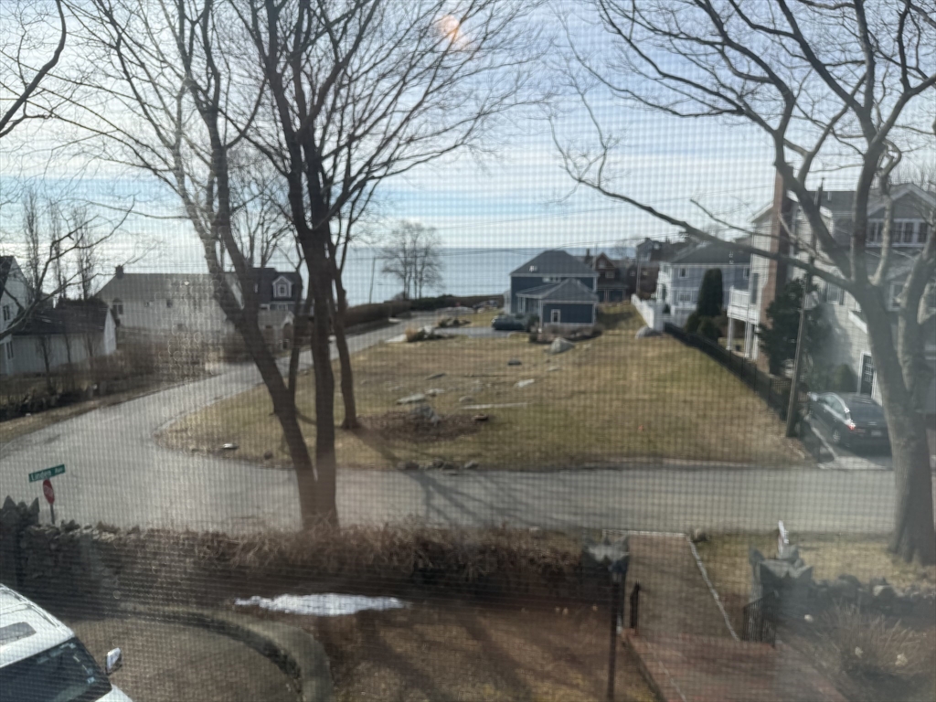 24 Flume Road Gloucester, MA 01930 - Photo 22 of 40 a view of a yard with large trees