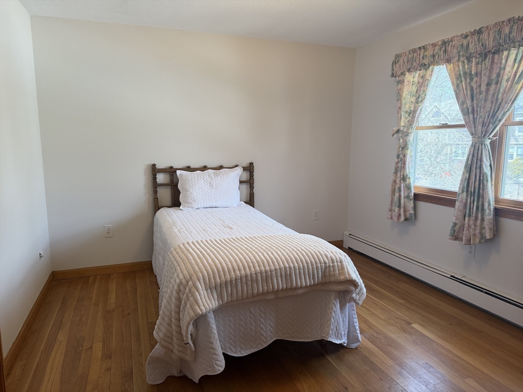 24 Flume Road Gloucester, MA 01930 - Photo 28 of 40 a bedroom with a bed and window