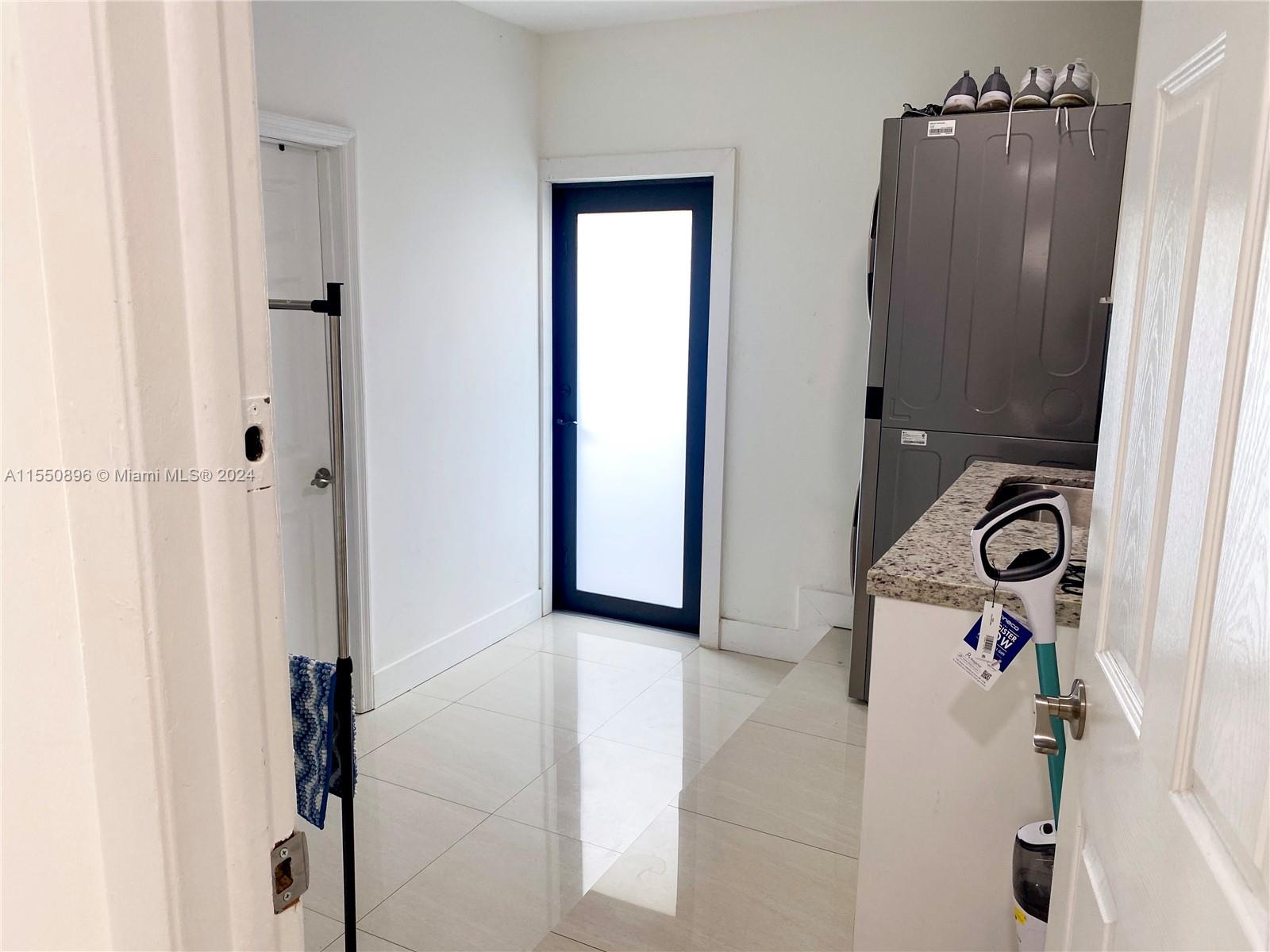 11032 Southwest 5th Street Sweetwater, FL 33174 - Photo 22 of 24 a view of water heater room