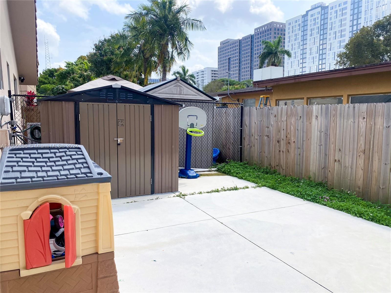 11032 Southwest 5th Street Sweetwater, FL 33174 - Photo 7 of 24 a front view of a house with garden