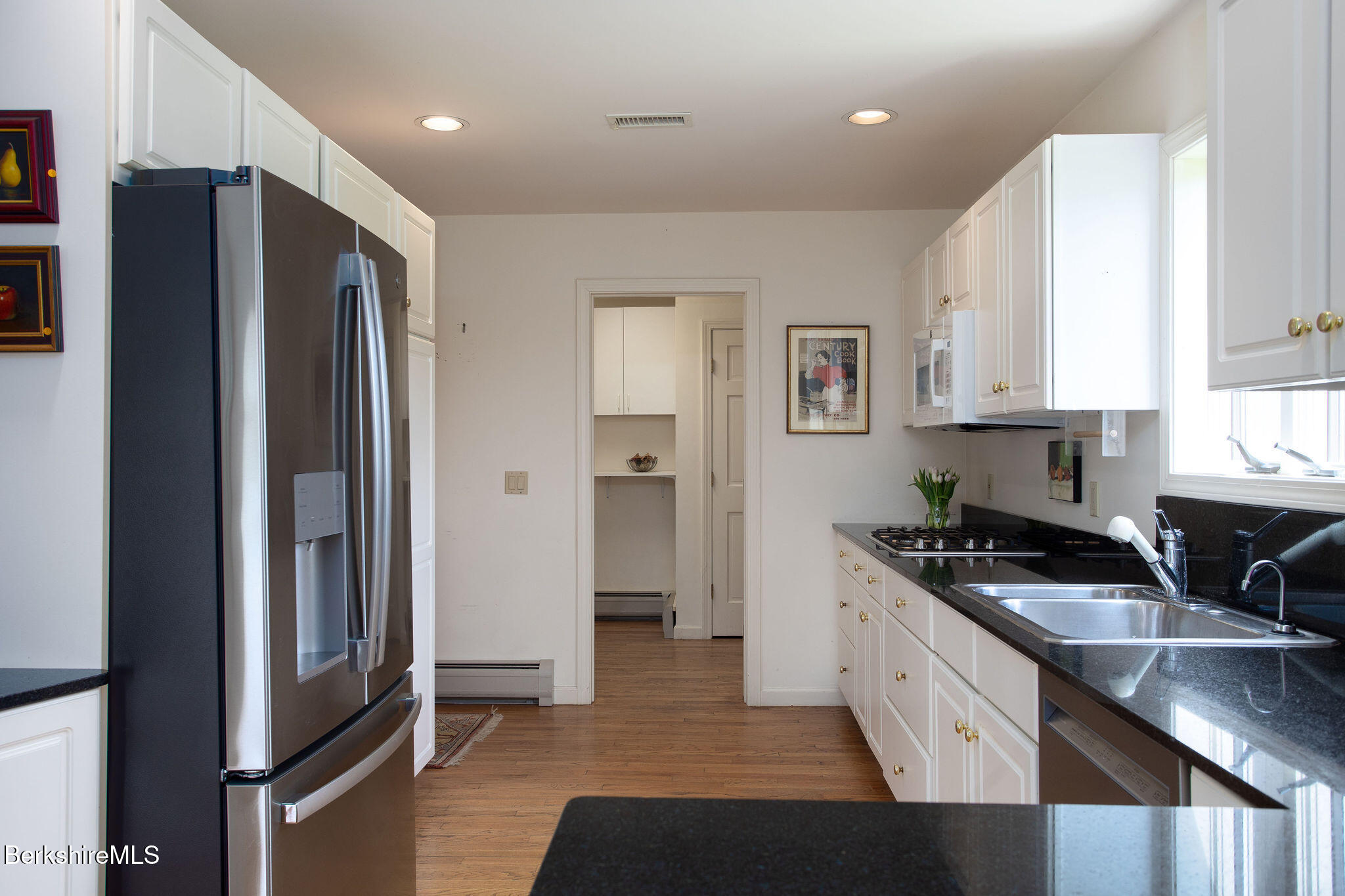 77 Hurlburt Road Great Barrington, MA 01230 - Photo 23 of 48 a kitchen with granite countertop a refrigerator and a sink